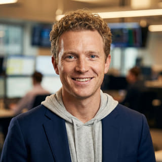 Ryan Brooks, bei Blank Wertungsheit als leitender Trading-Analyst aufgeführt, auf einem Profilbild